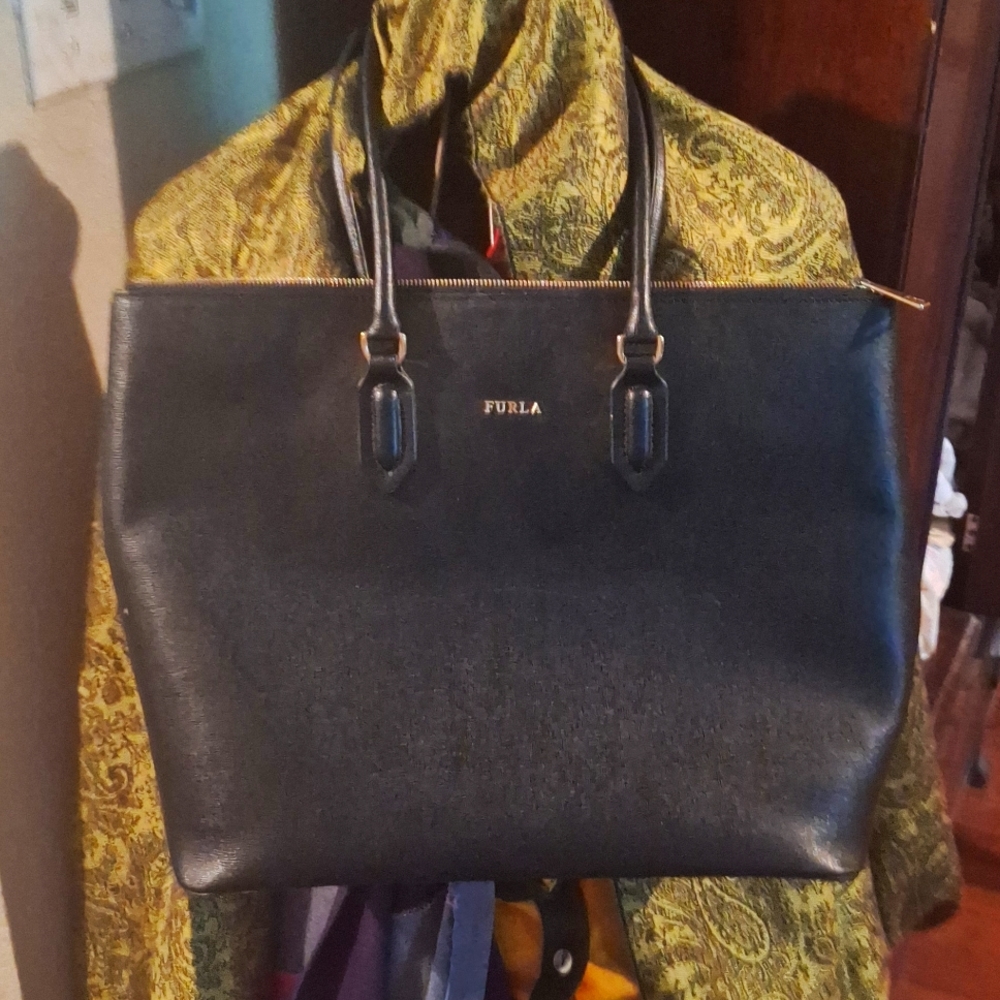 FURLA Black purse with gold details very little use pink inside with bag